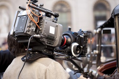 cameraman-shooting-closeup-of-old-vehicle